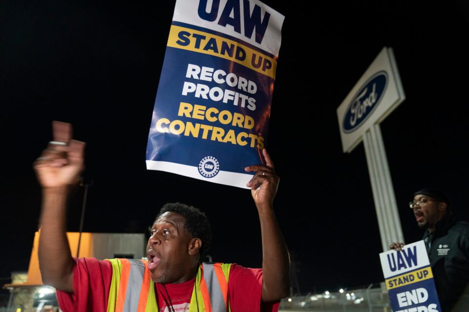 Michael Williams, 60, of St. Clair Shores, who works at Ford Dearborn Truck UAW Local 600, pickets at Ford Michigan Assembly Plant just after midnight on Friday after UAW President Shawn Fain called for a strike when contract negotiations stalled with all three Detroit automakers.