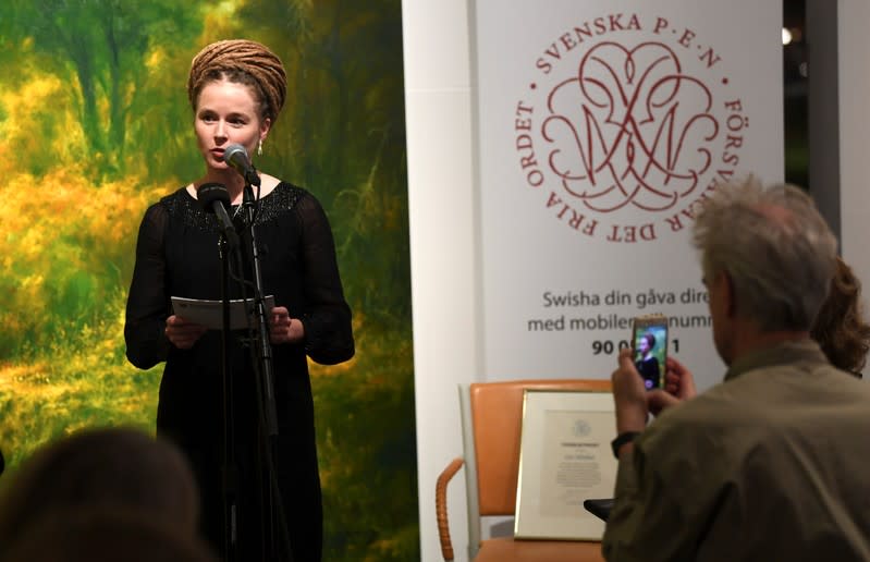 Swedish Culture and Democracy Minister Amanda Lind presents Svenska PEN's Tucholsky Prize to detained Swedish bookseller Gui Minhai in Stockholm