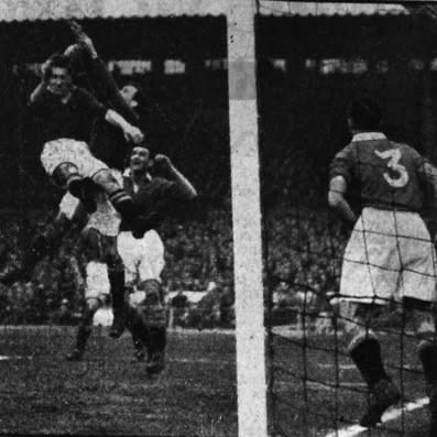 Roy Bentley challenges United's keeper, Jack Crompton - Credit: TELEGRAPH