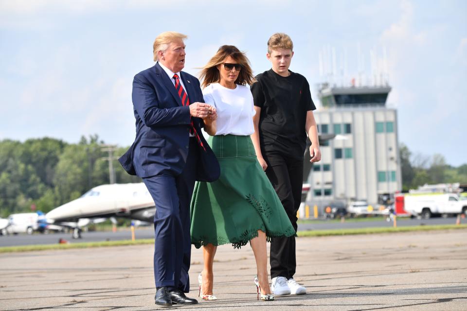 Donald Trump, Melania Trump and Barron Trump board Air Force One in  New Jersey to return to the White House [Photo: Getty]