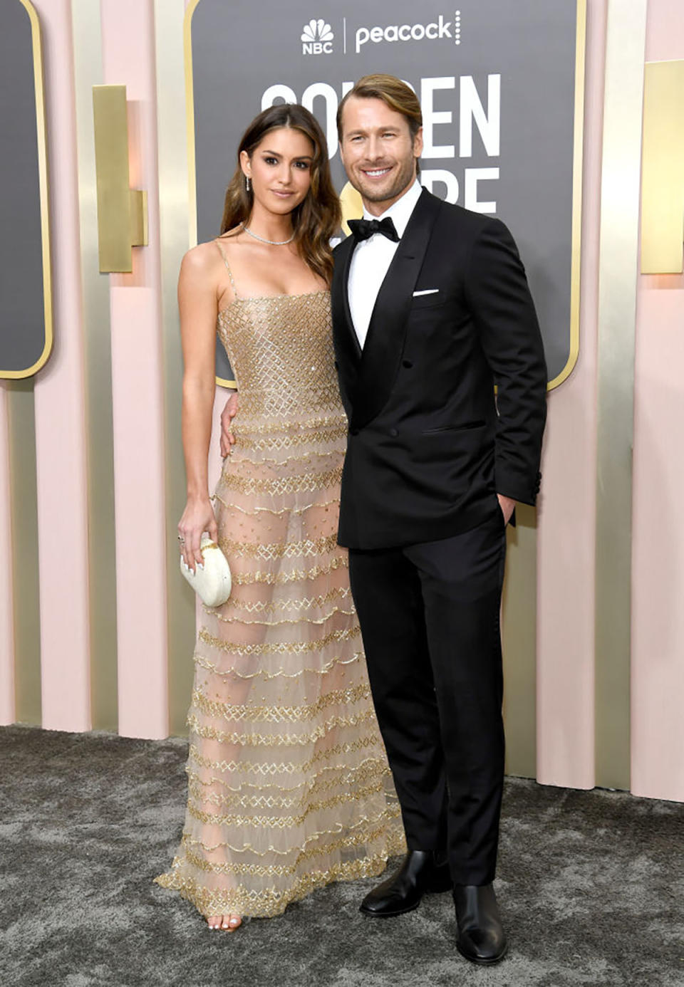 Gigi Paris and Glenn Powell on the Golden Globes red carpet