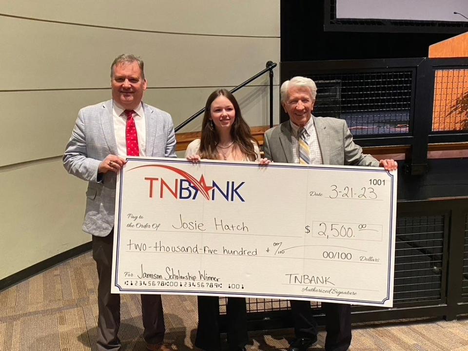 Josie Hatch, center, received a $2,500 scholarship named in honor of Frank Jamison, right. At left is TNBank President Mark Holder. The presentation was made at the Lunch 4 Literacy luncheon.