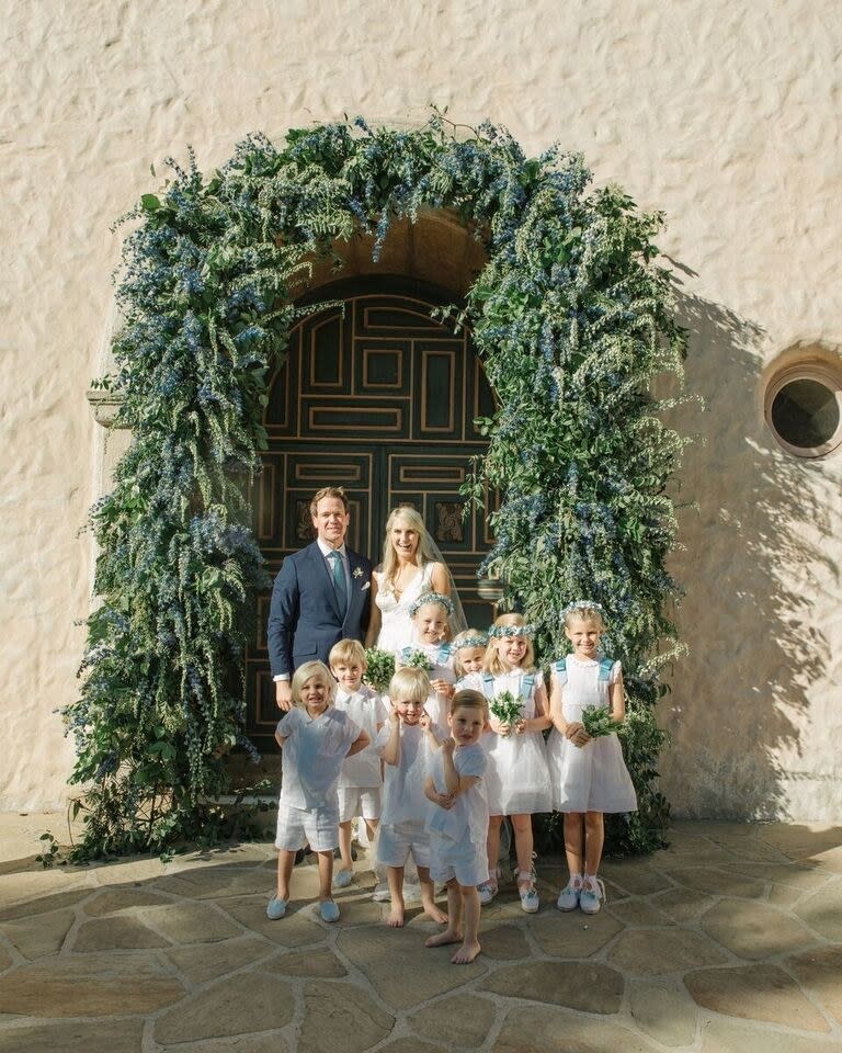 The bride combined California cool with English tradition, wore two Carolina Herrera dresses, and drove off in a vintage Porsche.