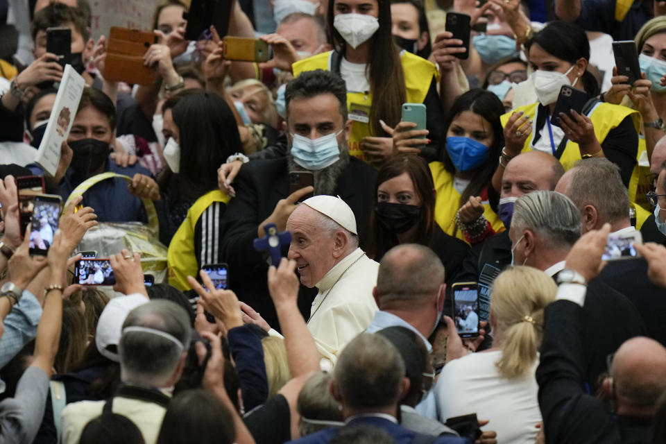 Pope Francis leaves after his weekly general audience in the Paul VI Hall at the Vatican, Wednesday, Sept. 29, 2021. (AP Photo/Alessandra Tarantino)