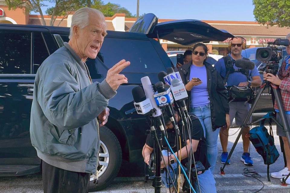 Former Trump White House official Peter Navarro speaks to reporters before he heads to prison on March 19, 2024 in Miami, to begin serving his sentence for refusing to cooperate with a congressional investigation into the Jan. 6, 2021, attack on the U.S. Capitol.