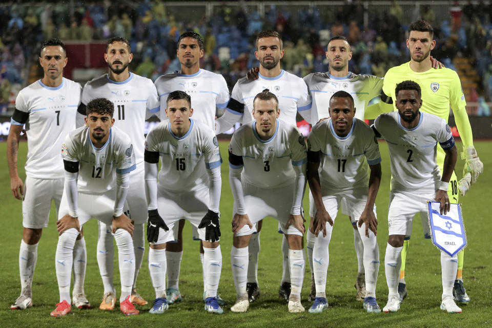 Israel's players line up during the Euro 2024 group I qualifying soccer match between Kosovo and Israel at the Fadil Vokrri stadium in Pristina, Kosovo, Sunday, Nov. 12, 2023. (AP Photo/Visar Kryeziu)