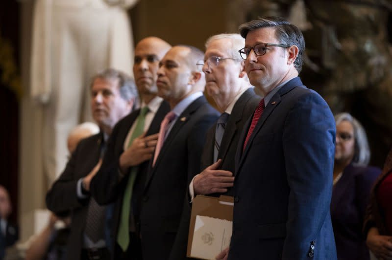 Speaker of the House Mike Johnson, R-La., Senate Minority Leader Mitch McConnell, R-Ky., House Minority Leader Hakeem Jeffries, D-N.Y., Sen. Cory Booker, D-N.J., .and Sen. Sherrod Brown, D-Ohio, look on during Wednesday's Congressional Gold Medal Ceremony posthumously honoring Major League Baseball player and civil rights activist Larry Doby, the first African American to play in the American league, at the U.S. Capitol in Washington, D.C. Photo by Bonnie Cash/UPI