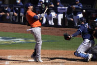 Houston Astros Yuli Gurriel is hit by a pitch by Tampa Bay Rays pitcher Charlie Morton during the fourth inning in Game 2 of a baseball American League Championship Series, Monday, Oct. 12, 2020, in San Diego. (AP Photo/Ashley Landis)