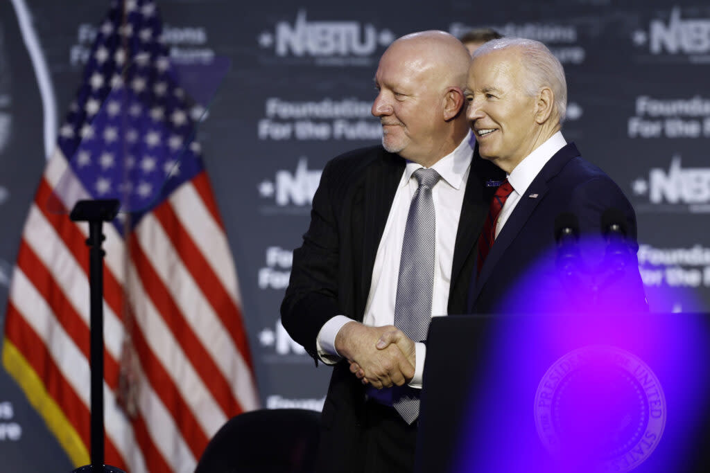President Joe Biden shakes hands with NABTU President Sean McGarvey after giving remarks at the North American Building Trades Unions 2024 Legislative Conference at the Washington Hilton on April 24, 2024, in Washington, D.C. Biden attended the conference to receive an official political endorsement from NABTU. (Photo by Anna Moneymaker/Getty Images)