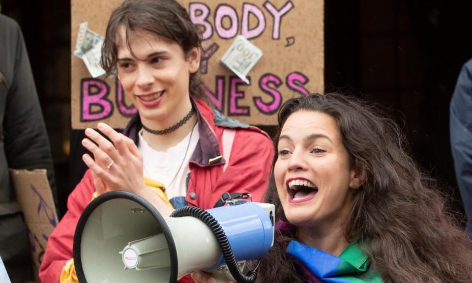 A dancer protests against moves to close a branch of Spearmint Rhino in Sheffield.