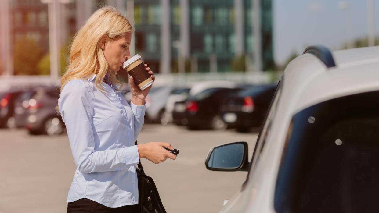 Businesswoman talking on the phone outdoors.