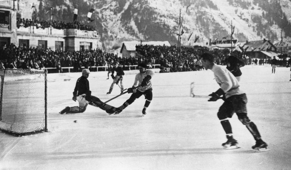 National teams from Canada and the USA in action during an ice hockey match at the Winter Olympic Games at Chamonix in 1924.