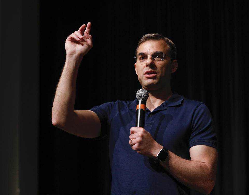 Rep. Justin Amash holds a town hall in Grand Rapids, Mich., in May. (Photo by Bill Pugliano/Getty Images)