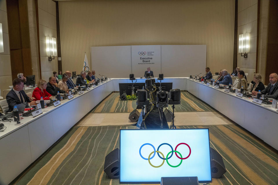 International Olympic Committee (IOC) president Thomas Bach, centre, speaks on the first day of the executive board meeting of the IOC ahead of the upcoming 141st IOC session in Mumbai, India, Thursday, Oct. 12, 2023.(AP Photo/Rafiq Maqbool)