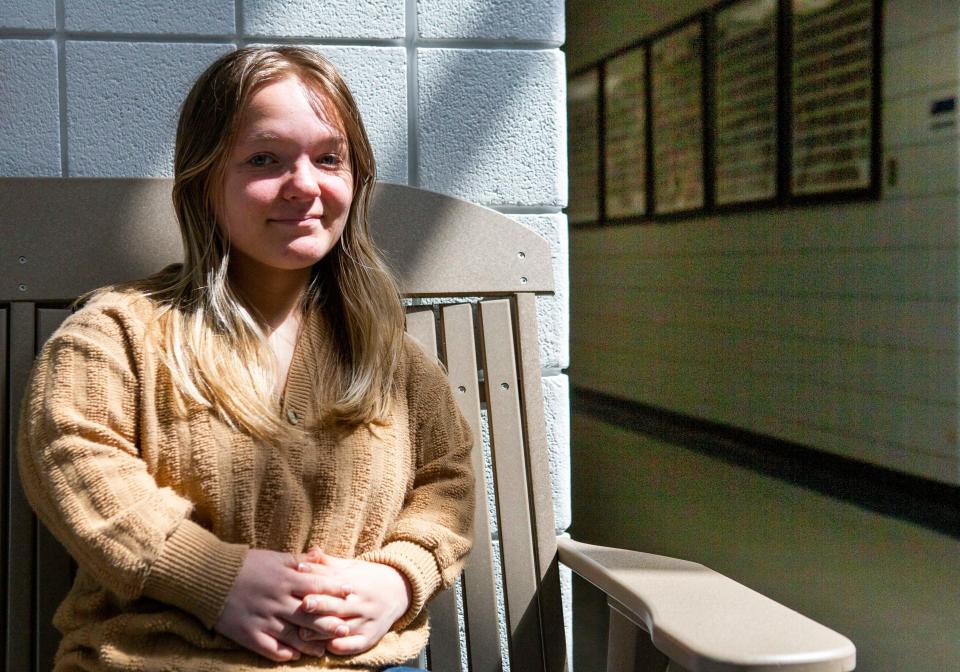 Granville High School senior Liz Hedger sits in the hallway at Granville High School in Granville, Ohio on May 18, 2022