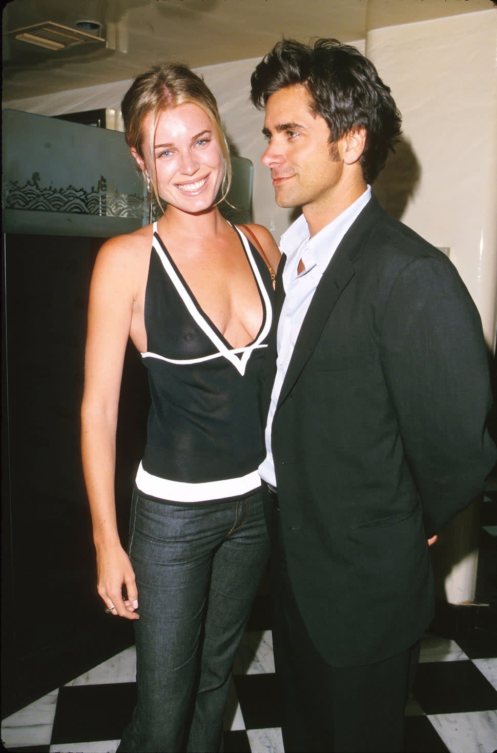 Rebecca Romijn and John Stamos