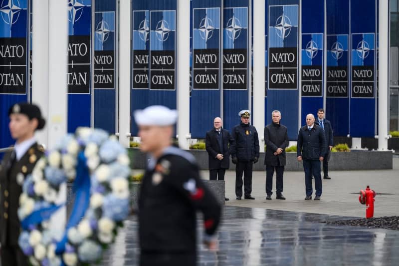 (L-R) Chair NATO Military Committee, Admiral Rob Bauer, NATO Secretary General Jens Stoltenberg and NATO Deputy Secretary General Mircea Geoana attend a laying wreath ceremony in memory of military personnel of NATO countries killed in service. -/NATO/dpa