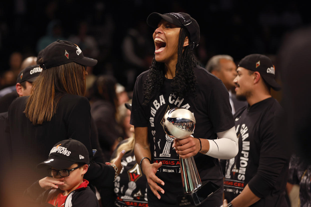Las Vegas Aces forward A'ja Wilson celebrates after winning WNBA Finals MVP and the Aces' second straight championship on Wednesday in New York. (Photo by Sarah Stier/Getty Images)