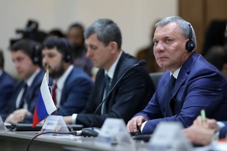 Russian Deputy Prime Minister Yury Borisov takes part in a meeting in Caracas