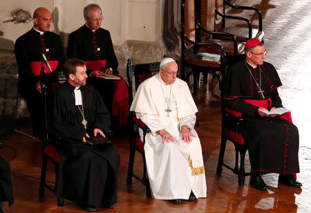 Pope Francis attends a ecumenical church service at the Riga Dome Cathedral in Riga, Latvia, during the second leg of Pope Francis' trip to the Baltic states, September 24, 2018. REUTERS/Max Rossi