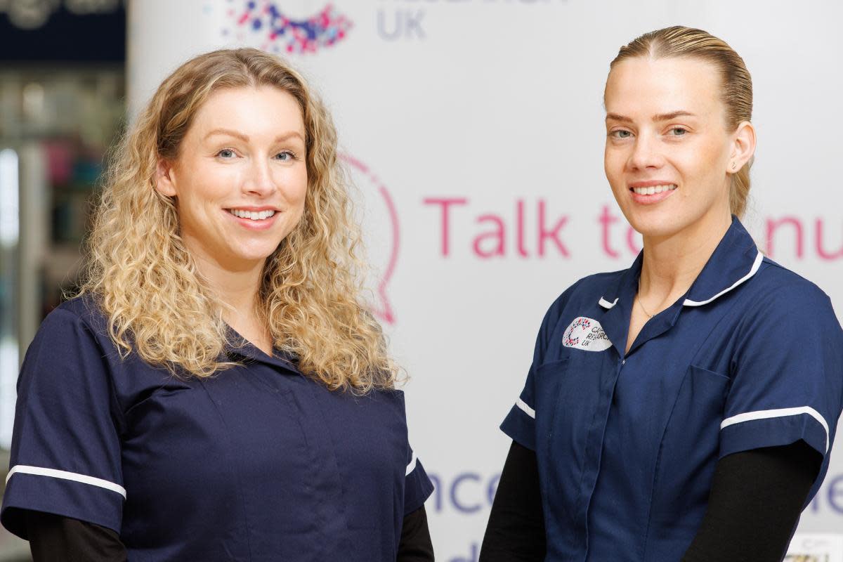 (Left to right) Cancer Research UK roadshow nurses Jess Cuddy and Laura Conaghan <i>(Image: Steve Welsh)</i>