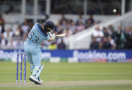 England's Jos Buttler slices the ball to be caught out for 59 runs.(AP Photo/Matt Dunham)