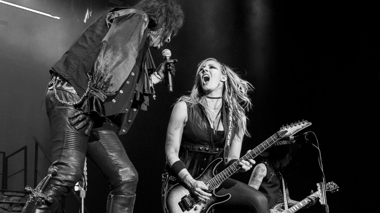  Alice Cooper performs with Nita Strauss on stage at The O2 Arena on October 10, 2019 in London, England. . 