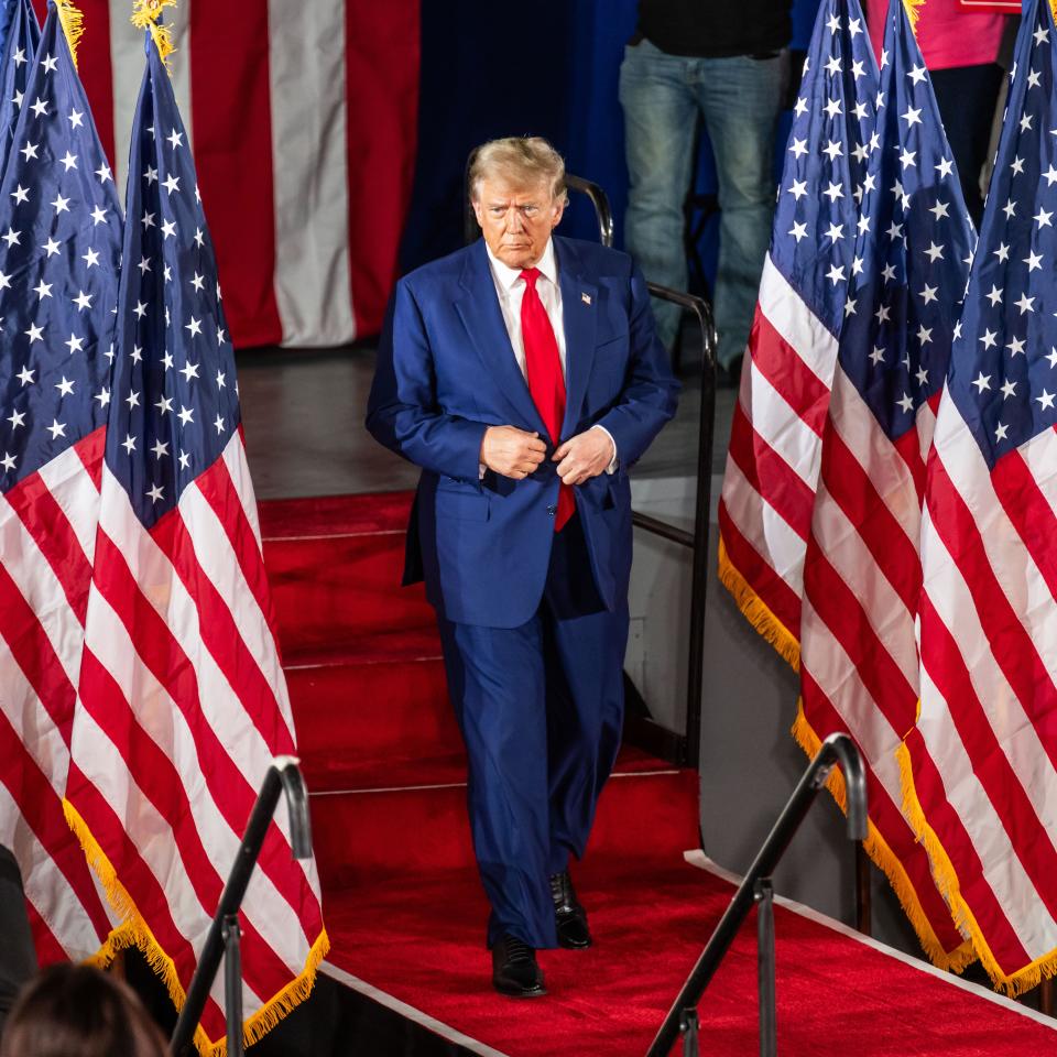 Donald Trump makes his entrance at the Waukesha County Expo Center in Waukesha, Wisconsin for a campaign rally on Wednesday, May 1, 2024