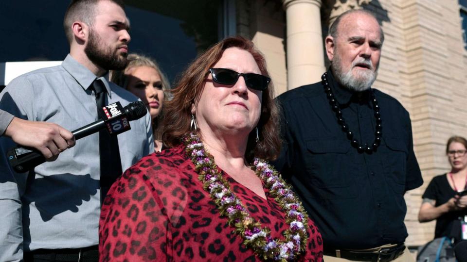 PHOTO: Kay Woodcock, center, and Larry Woodcock, right, address the media outside court at a hearing for Lori Vallow Daybell, March 6, 2020, in Rexburg, Idaho. (Pool/The Idaho Post-Register via AP)