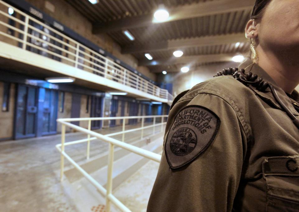 A correctional officer is seen in one of the housing units at Pelican Bay State Prison in California.