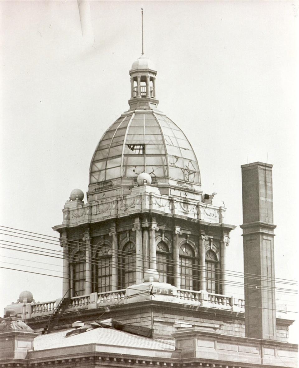 After a windstorm on May 5, 1950, damaged the glass dome and ornamental copper sheeting at the Manitowoc County Courthouse, stainless steel panels replaced glass panes in the upper portion of the dome.