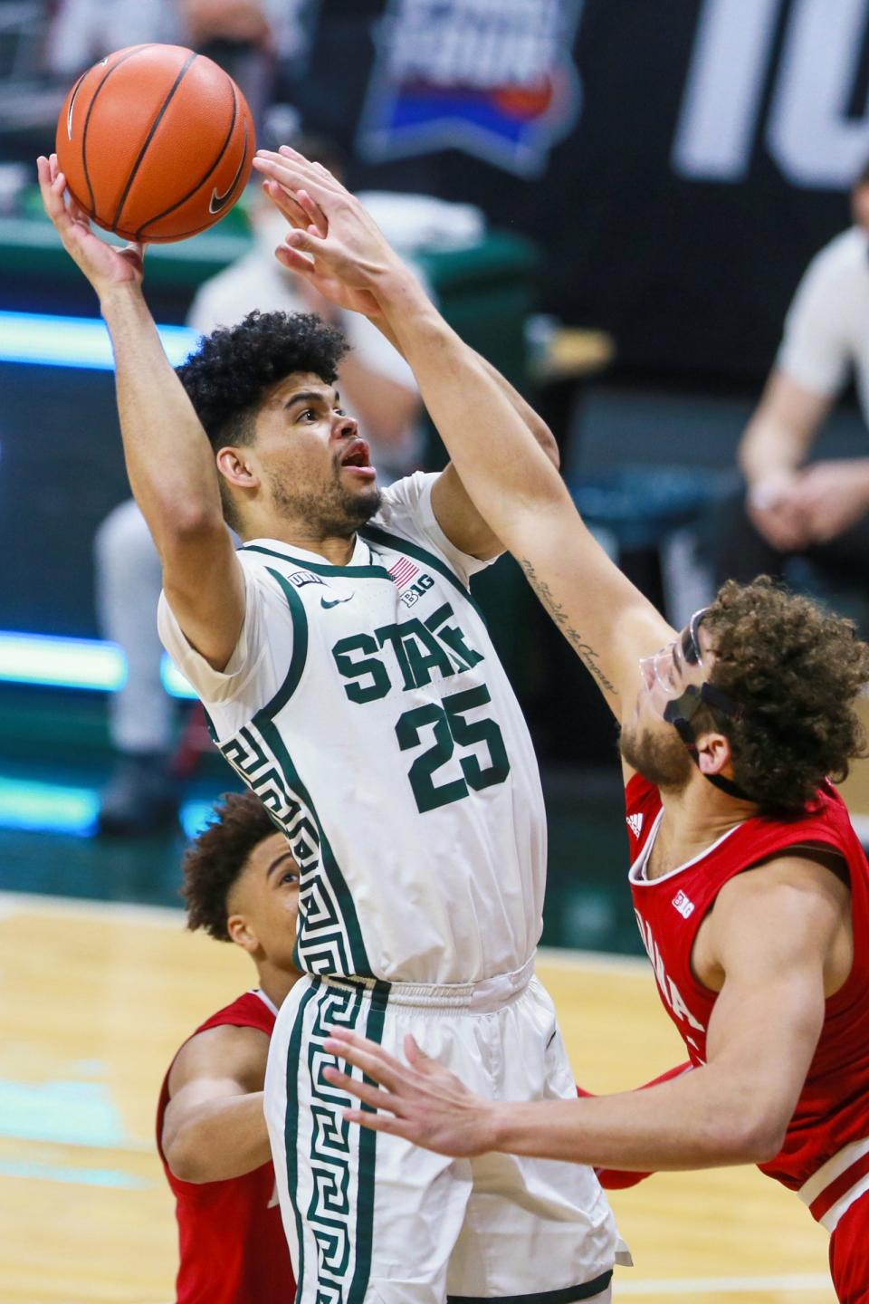 Michigan State forward Malik Hall (25) attempts a layup in the first half against Indiana on Tuesday, March 2, 2021, in East Lansing.