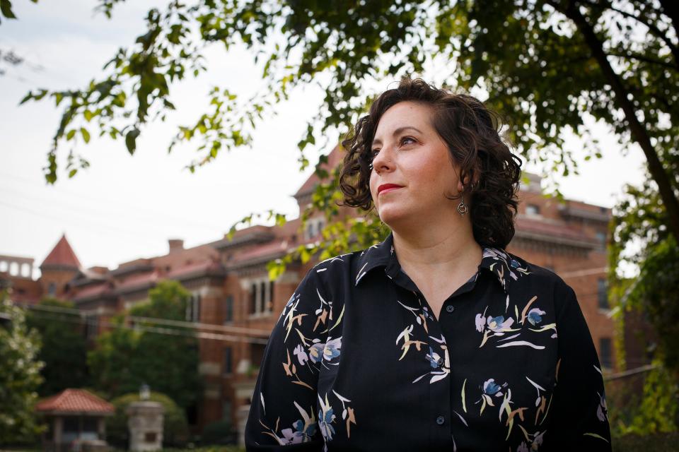 Basak Durgun poses in a park near her home in the Walnut Hills neighborhood of Cincinnati on Wednesday, Sept. 23, 2020. Durgun found herself without a job for the current school year when Miami University announced a hiring freeze, leaving her without a new contract and with massive student loan debt. 