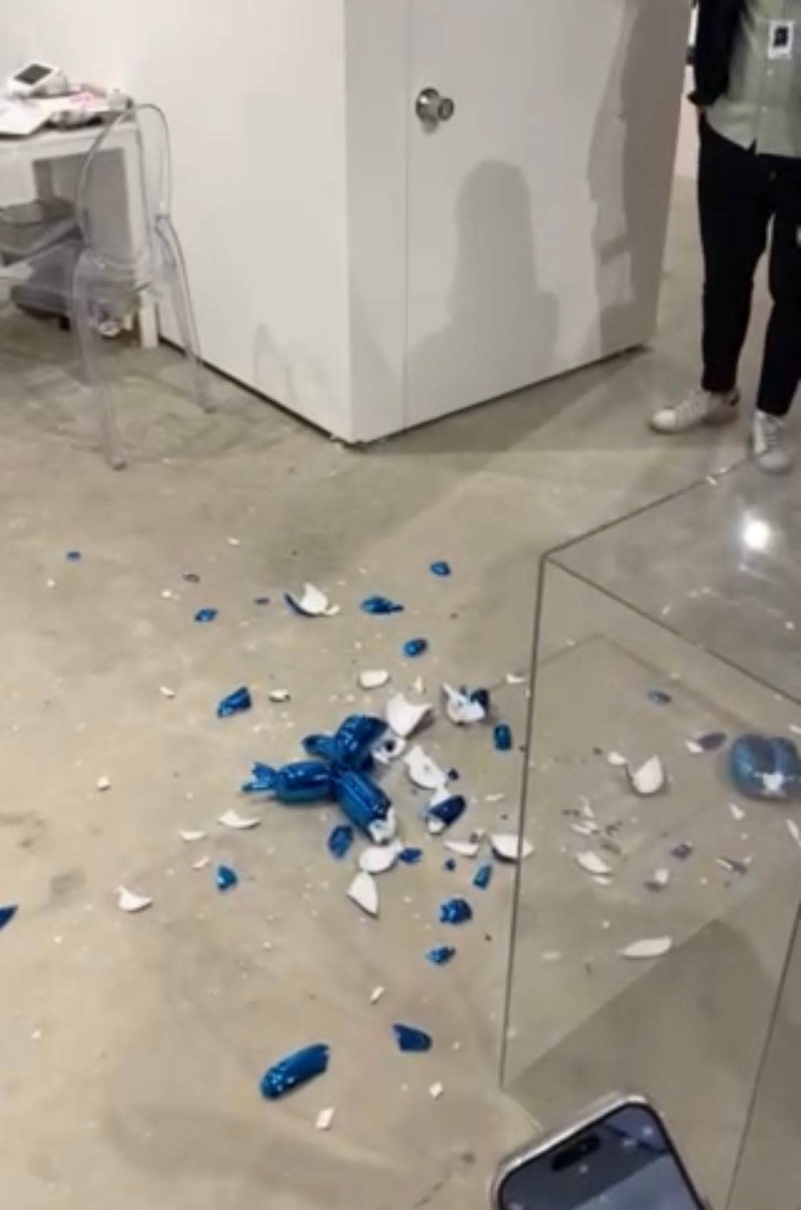 The scene at the Bel-Air Fine Art booth just after a patron of Art Wynwood accidentally destroyed a Jeff Koons sculpture.