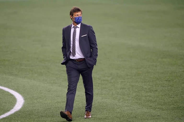 San Jose Earthquakes coach Matias Almeyda walks on the pitch after the first half of the teams MLS soccer match against the Seattle Sounders, Thursday, Sept. 10, 2020, in Seattle.