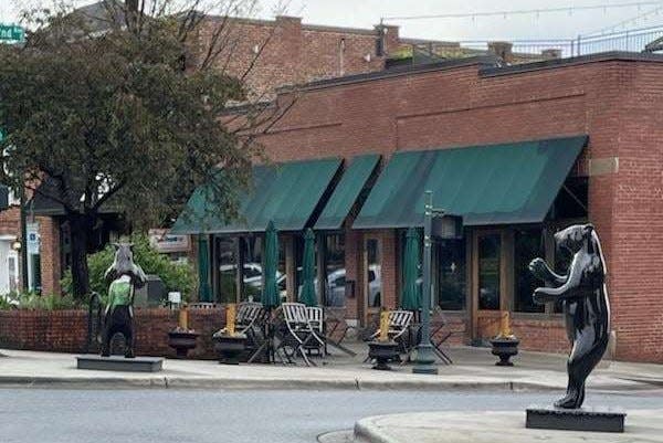 "Buzzter Sobear" is one of the 20 new Bearfootin' Bears now on display along Main Street in Hendersonville.