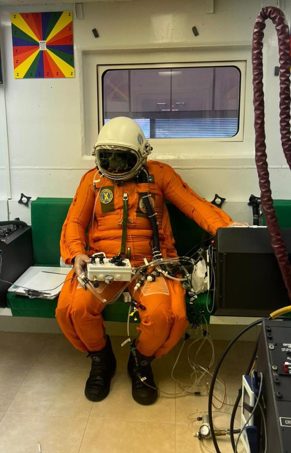 Miguel Iturmendi tests his partial pressure suit on Nov. 8., inside the altitude chamber at the John D. Odegard School of Aerospace Sciences at the University of North Dakota. He will wear the suit when he attempts to pilot Helios Horizon, an electric-powered airplane, into the stratosphere.