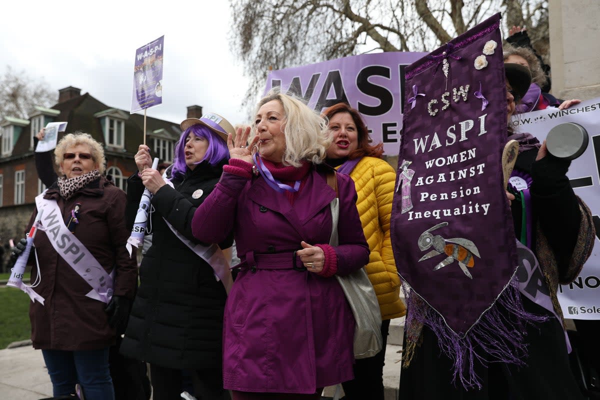 Women against state pension inequality (WASPI) protest outside the Houses of Parliament on March 13, 2019 (AFP via Getty Images)