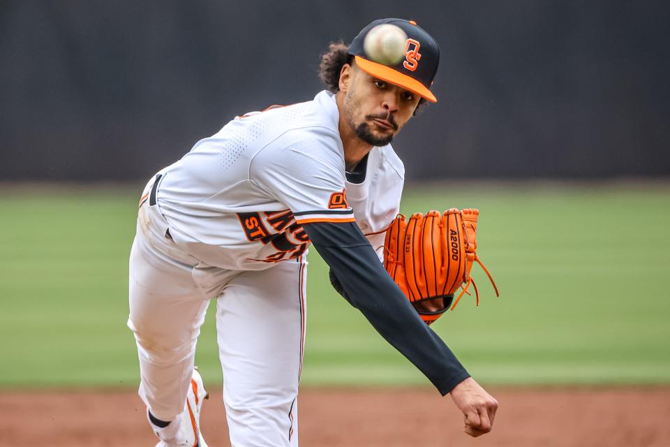 Oklahoma State's Juaron Watts-Brown throws a pitch during a game against Loyola Marymount at O’Brate Stadium in Stillwater on Feb. 25.