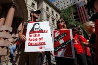 <p>Protesters gather before a rally by the right-wing Patriot Prayer group in Portland, Ore., Aug. 4, 2018. (Photo: Bob Strong/Reuters) </p>