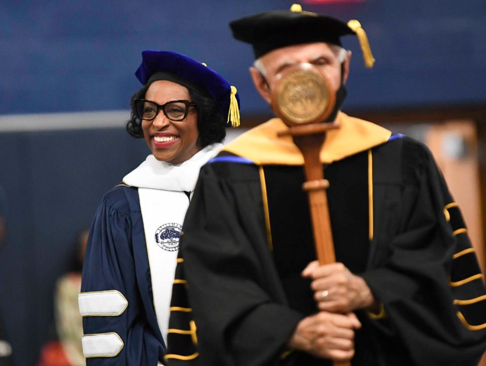 April 12, 2024; Tuscaloosa, Alabama, USA; Sher Kanner carries the mace before President Yolanda Page during her the investiture ceremony at Stillman College Friday.