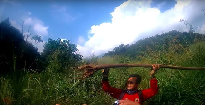 One of the bikers found the stick that the bald man was carrying. Photo: Youtube/Fredography