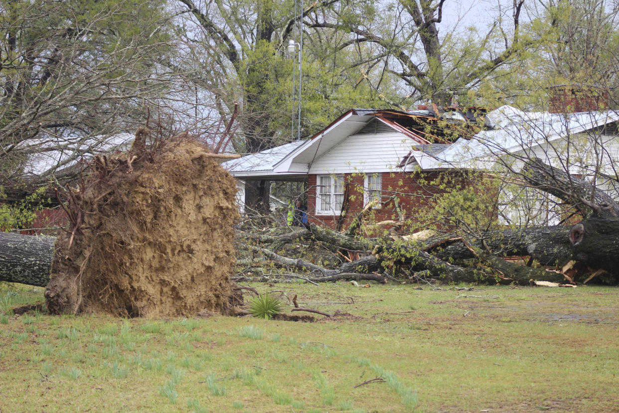 A home in the Whynot Community in Lauderdale County, Miss. was damaged after trees fell on it during a storm on Tuesday, April 5, 2022. (Bill Graham/The Meridian Star via AP)
