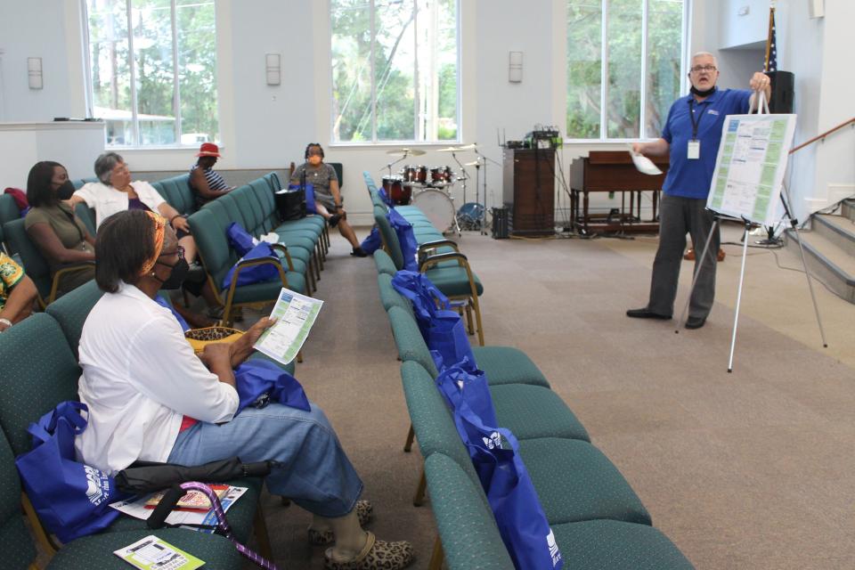 A customer service representative at Gainesville Regional Utilities guided residents on how to read their utility bills properly during the GRU in the Neighborhood event at Dayspring Baptist Church in northeast Gainesville.