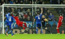 Football Soccer - Leicester City v Liverpool - Barclays Premier League - King Power Stadium - 2/2/16 Leicester City's Kasper Schmeichel saves from Liverpool's Emre Can Action Images via Reuters / Jason Cairnduff Livepic EDITORIAL USE ONLY. No use with unauthorized audio, video, data, fixture lists, club/league logos or "live" services. Online in-match use limited to 45 images, no video emulation. No use in betting, games or single club/league/player publications. Please contact your account representative for further details.