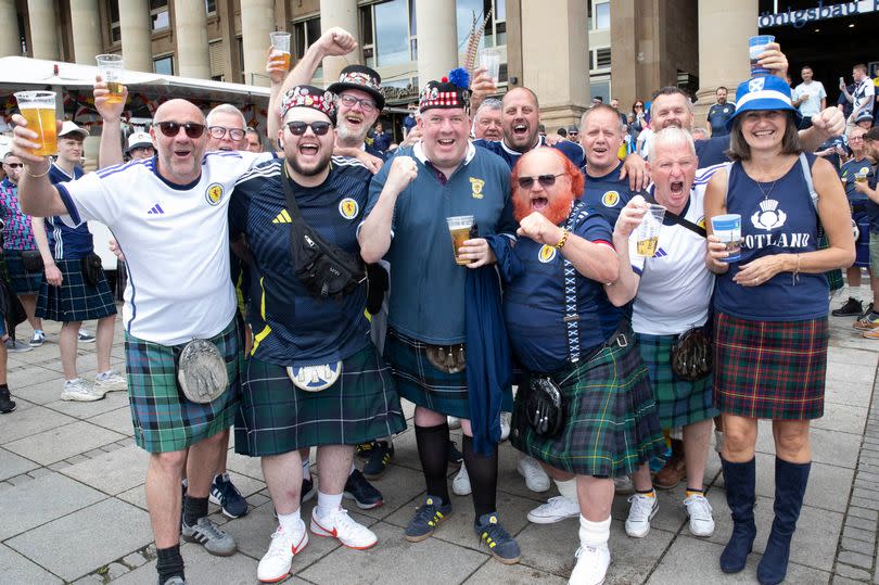 Scott Cameron from Rothes with the Sons of Scotland Tartan Army