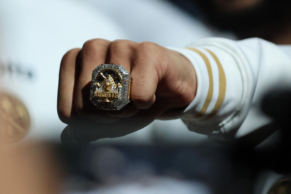 Denver Nuggets point guard Jamal Murray shows his championship ring before the game against the Los Angeles Lakers at Ball Arena in Denver, on Oct. 24, 2023. (Photo by Justin Tafoya/Getty Images)