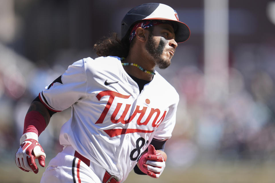 Minnesota Twins' Austin Martin runs the bases after hitting a solo home run during the ninth inning of a baseball game against the Detroit Tigers, Sunday, April 21, 2024, in Minneapolis. (AP Photo/Abbie Parr)