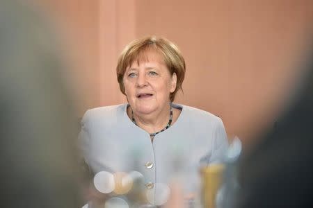 German Chancellor Angela Merkel attends the weekly cabinet meeting at the Chancellery in Berlin, Germany June 21, 2017. REUTERS/Stefanie Loos