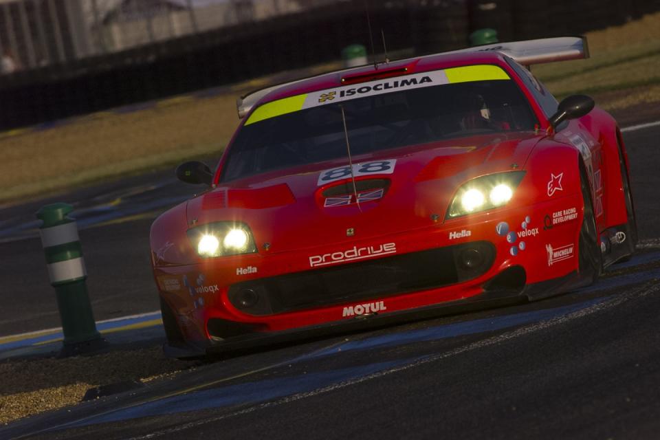 a red race car on a track